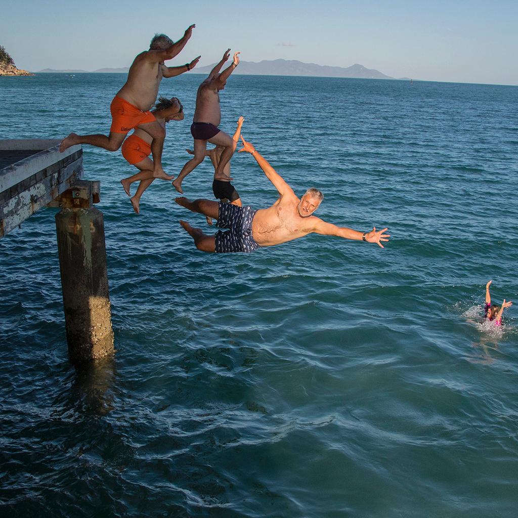 Fancy foot and handwork at the Pier Jumping - SeaLink Magnetic Island Race Week 2017 © Chanelle Robinson